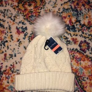 cream beanie with puff ball